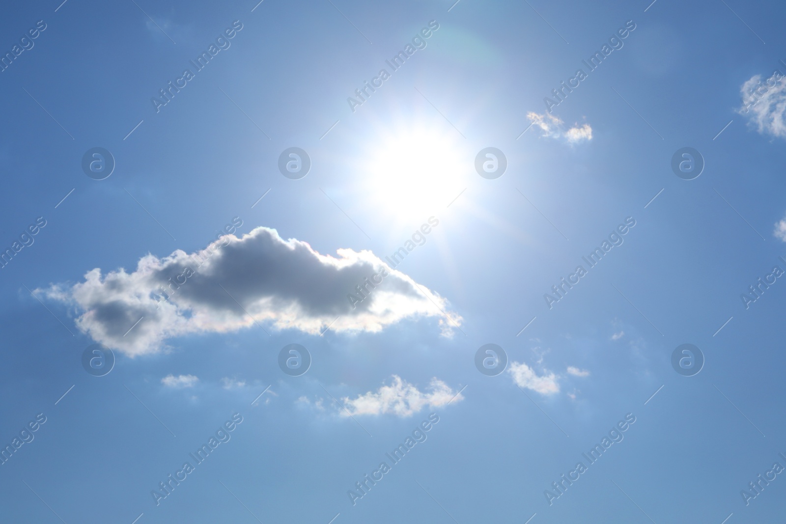 Photo of Beautiful blue sky with clouds on sunny day, low angle view