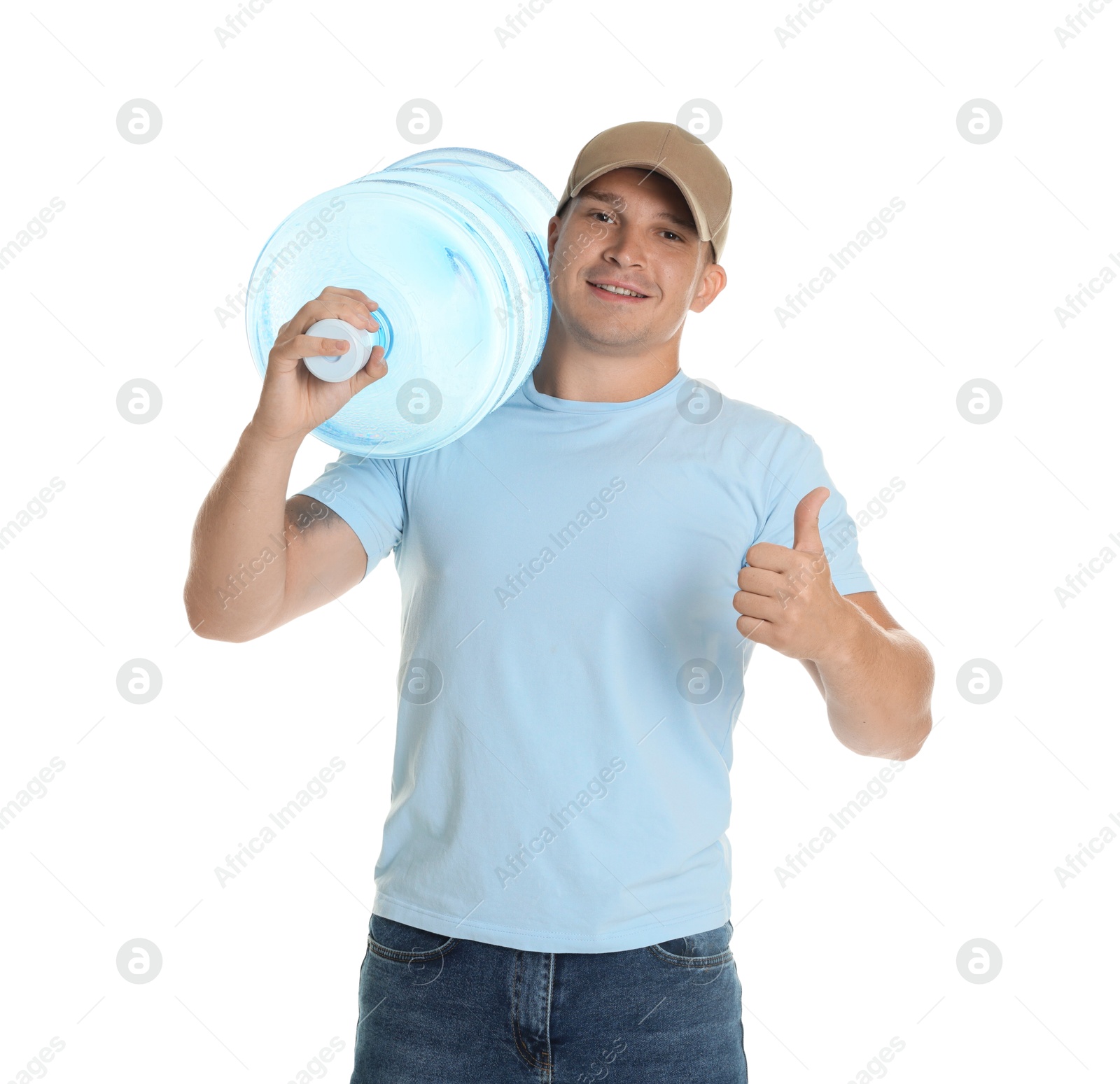 Photo of Smiling delivery man with cooler bottle of water showing thumbs up on white background
