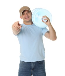 Photo of Smiling delivery man with cooler bottle of water pointing at camera on white background