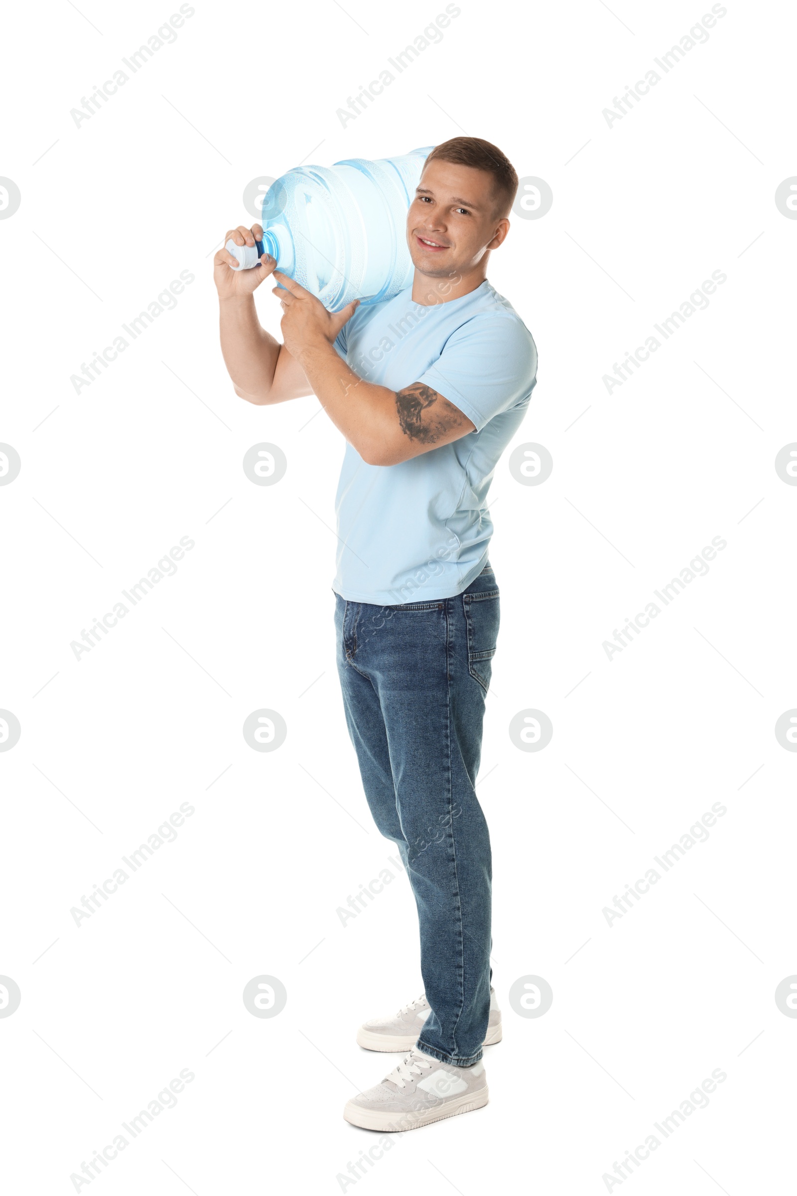 Photo of Smiling delivery man with cooler bottle of water on white background