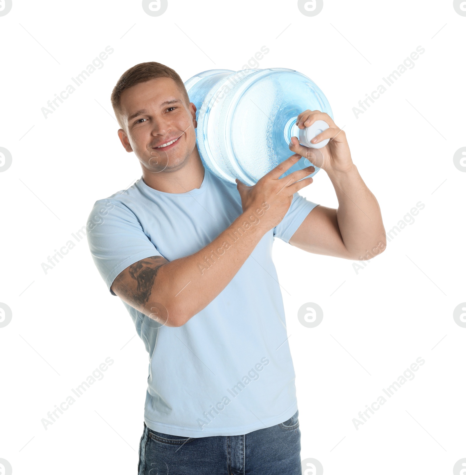 Photo of Smiling delivery man with cooler bottle of water on white background