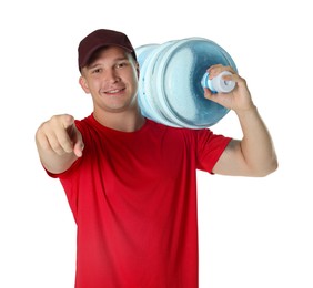 Photo of Smiling delivery man with cooler bottle of water pointing at camera on white background