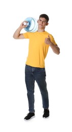 Photo of Delivery man with cooler bottle of water showing thumbs up on white background
