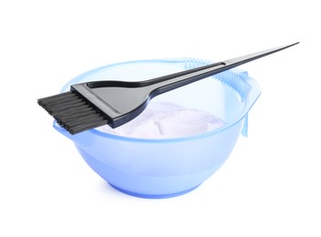 Photo of Care cosmetic product for blonde hair. Powder in bowl and brush isolated on white