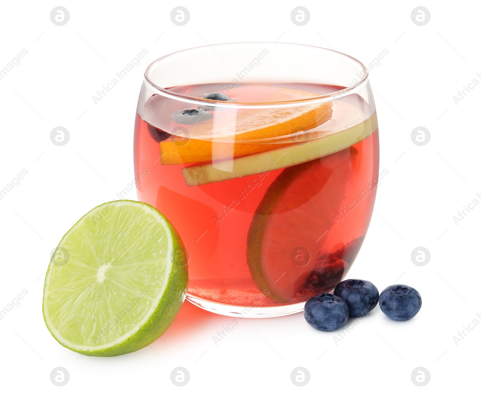 Tasty punch with slices of fruits and blueberries in glass isolated on white. Refreshing drink Photo of Tasty punch with slices of fruits and blueberries in glass isolated on white. Refreshing drink