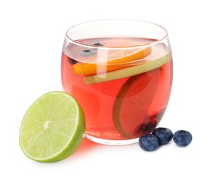 Photo of Tasty punch with slices of fruits and blueberries in glass isolated on white. Refreshing drink