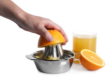 Photo of Making juice. Woman with orange using juicer on white background, closeup