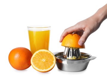 Photo of Making juice. Woman with orange using juicer on white background, closeup