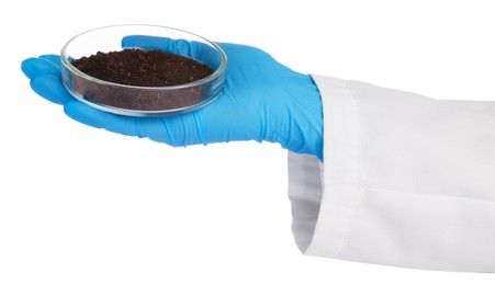 Photo of Scientist holding Petri dish with soil sample on white background, closeup