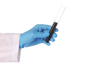 Photo of Scientist holding test tube with soil sample on white background, closeup