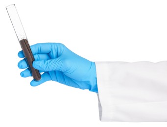 Photo of Scientist holding test tube with soil sample on white background, closeup