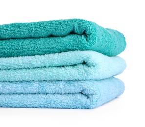Photo of Stack of colorful terry towels isolated on white