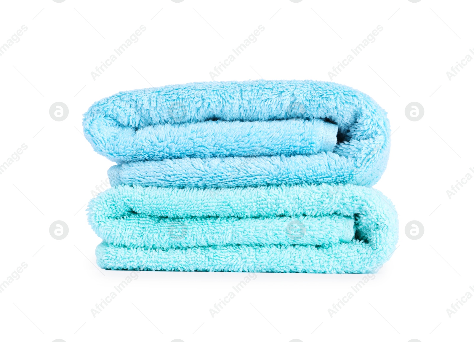 Photo of Stack of colorful terry towels isolated on white
