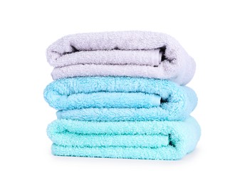 Photo of Stack of colorful terry towels isolated on white