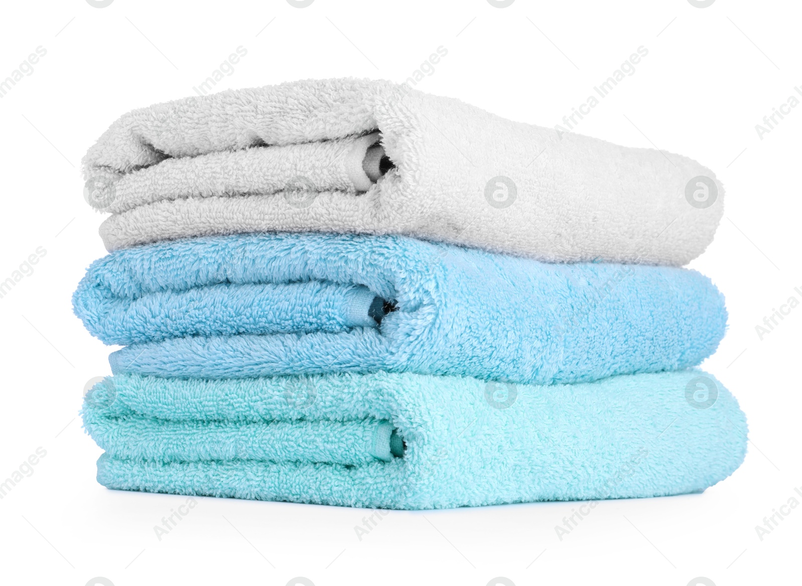 Photo of Stack of colorful terry towels isolated on white