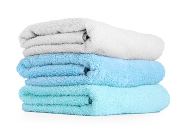 Photo of Stack of colorful terry towels isolated on white
