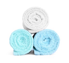 Photo of Stack of rolled terry towels isolated on white