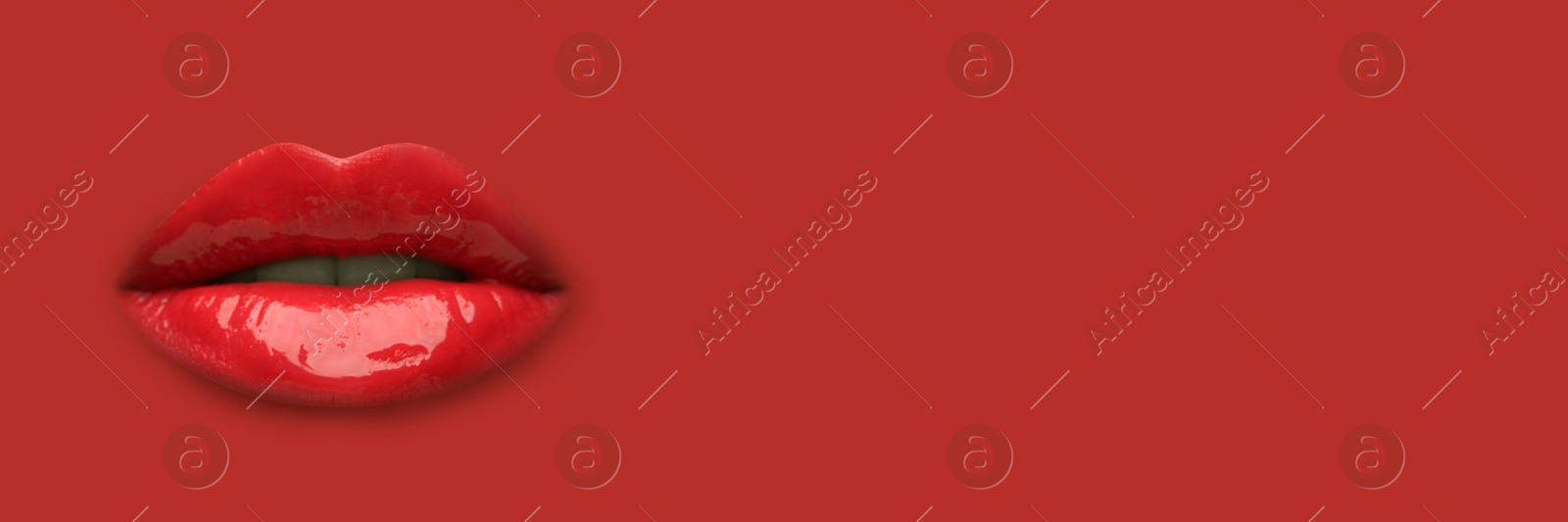 Woman's lips against background matching color of her lipstick. Banner design with space for text Image of Woman's lips against background matching color of her lipstick. Banner design with space for text