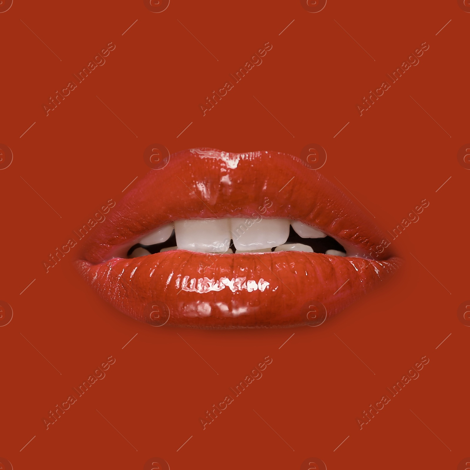 Woman's lips against background matching color of her lipstick Image of Woman's lips against background matching color of her lipstick
