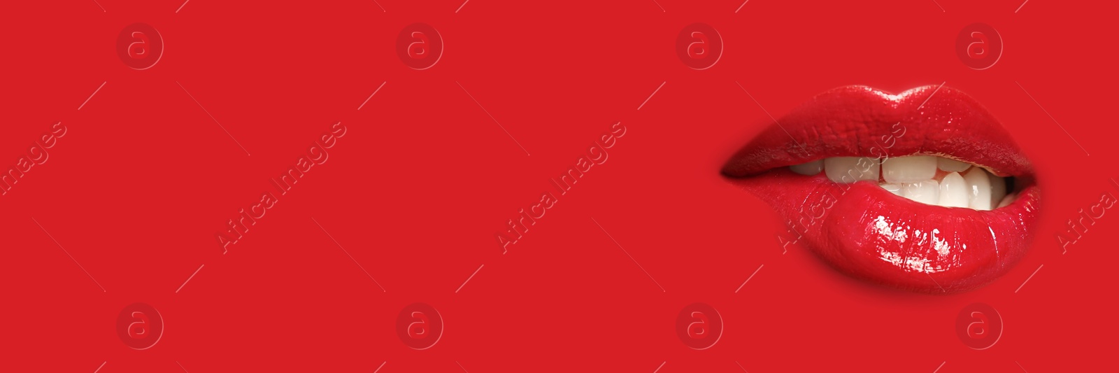 Woman's lips against background matching color of her lipstick. Banner design with space for text Image of Woman's lips against background matching color of her lipstick. Banner design with space for text