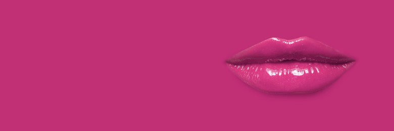 Image of Woman's lips against background matching color of her lipstick. Banner design with space for text