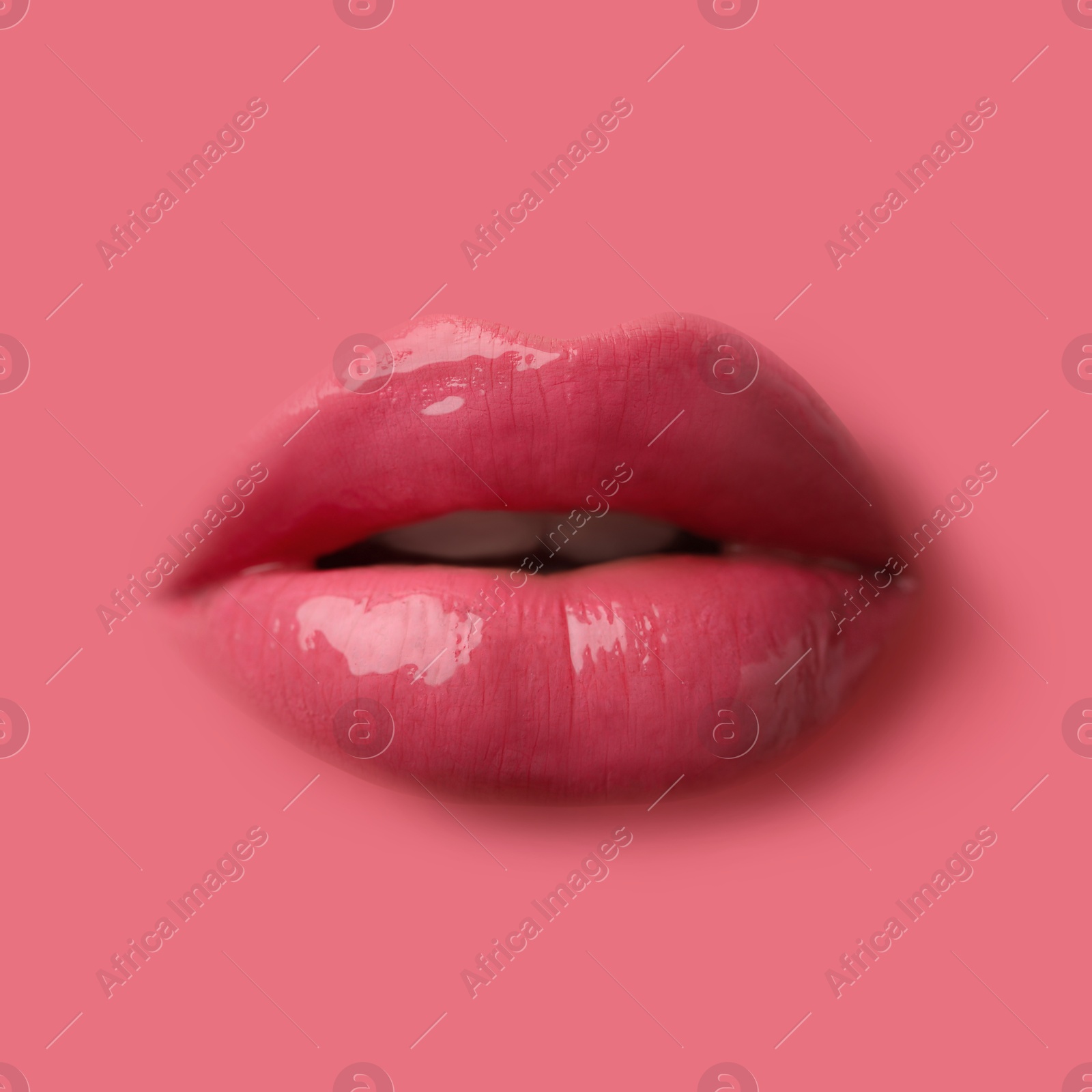 Woman's lips against background matching color of her lipstick Image of Woman's lips against background matching color of her lipstick
