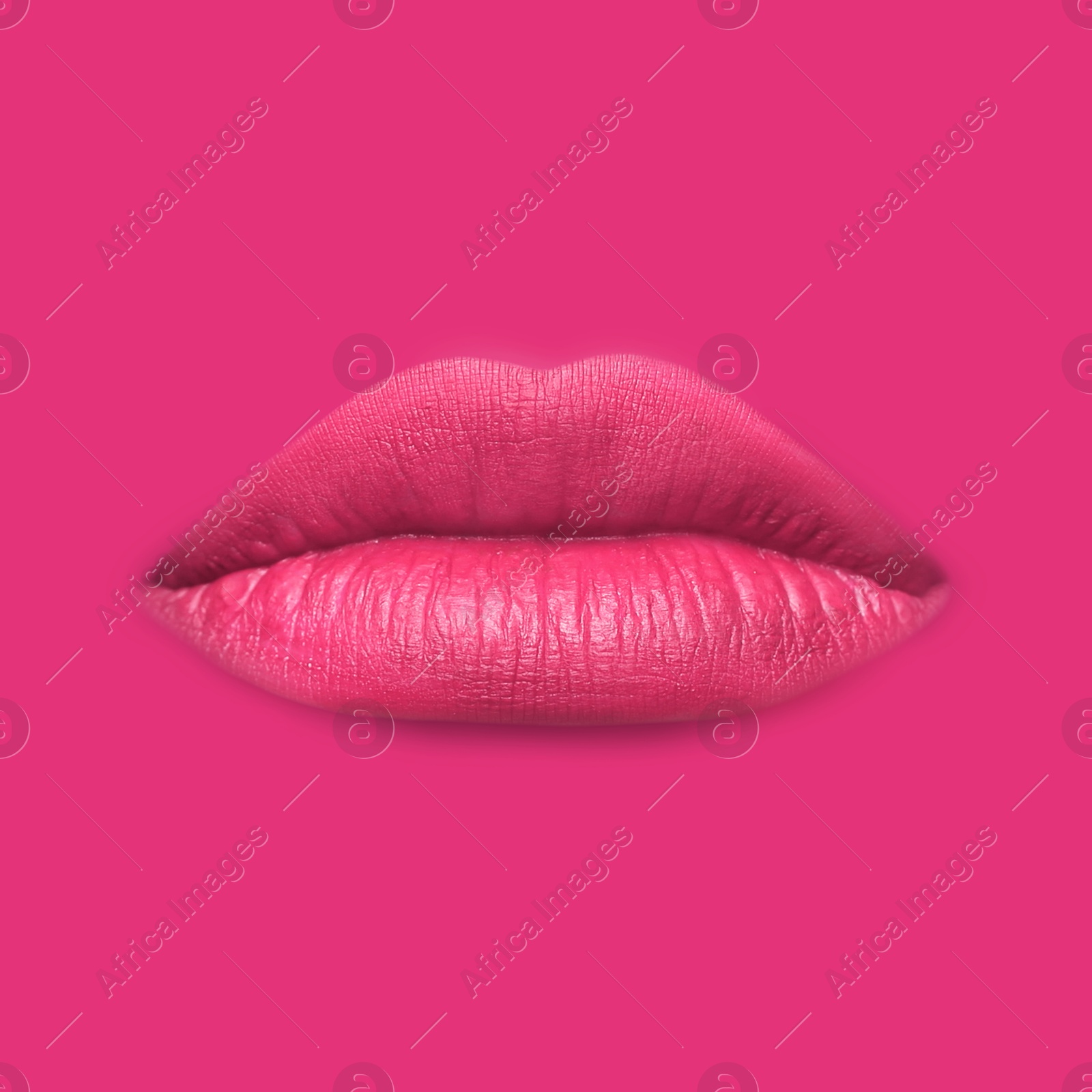 Woman's lips against background matching color of her lipstick Image of Woman's lips against background matching color of her lipstick