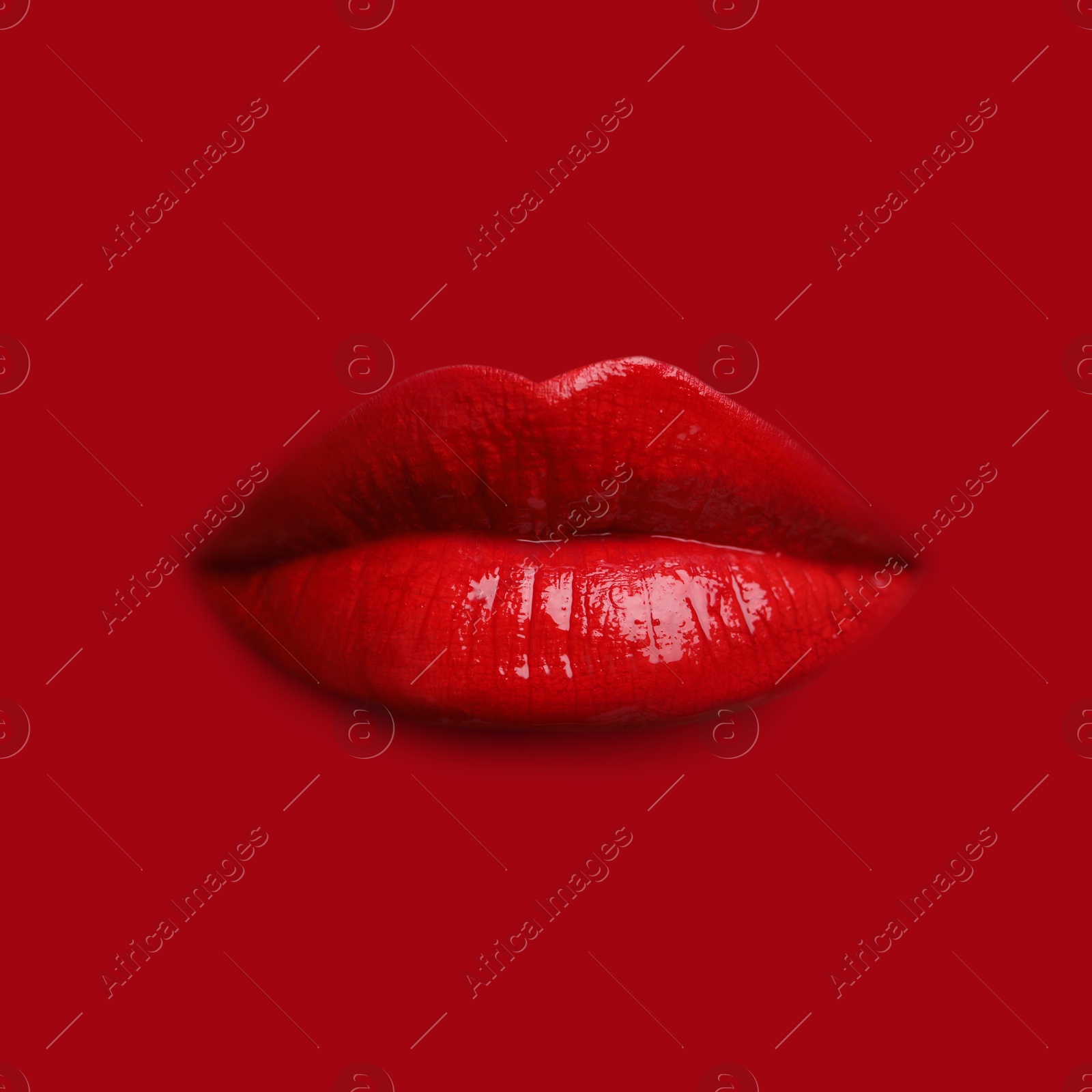 Woman's lips against background matching color of her lipstick Image of Woman's lips against background matching color of her lipstick