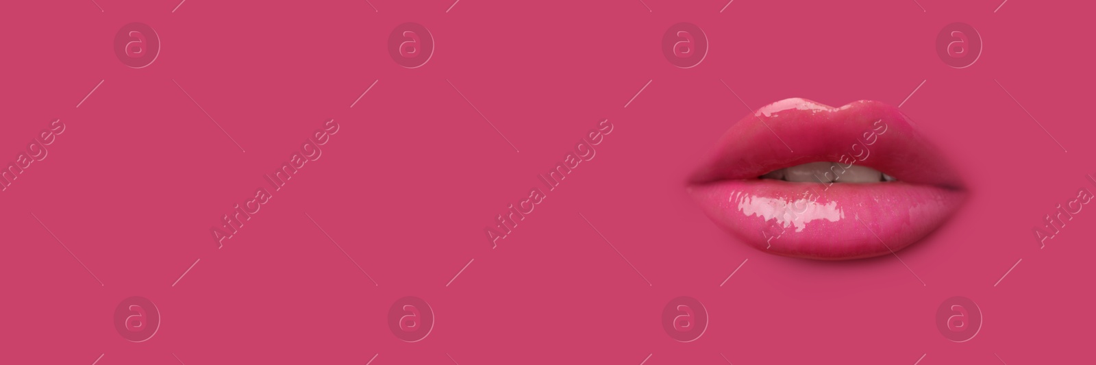 Woman's lips against background matching color of her lipstick. Banner design with space for text Image of Woman's lips against background matching color of her lipstick. Banner design with space for text