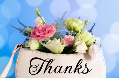 Image of Thank You card design with flowers in bag against blue background with bokeh lights