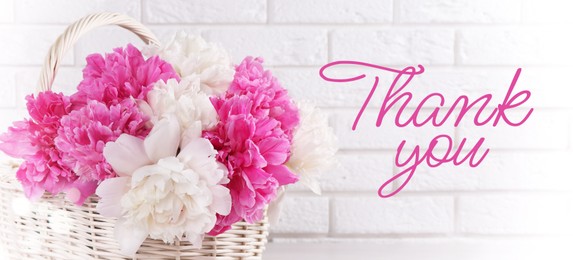 Image of Thank You card design with peony flowers in wicker basket against white brick wall