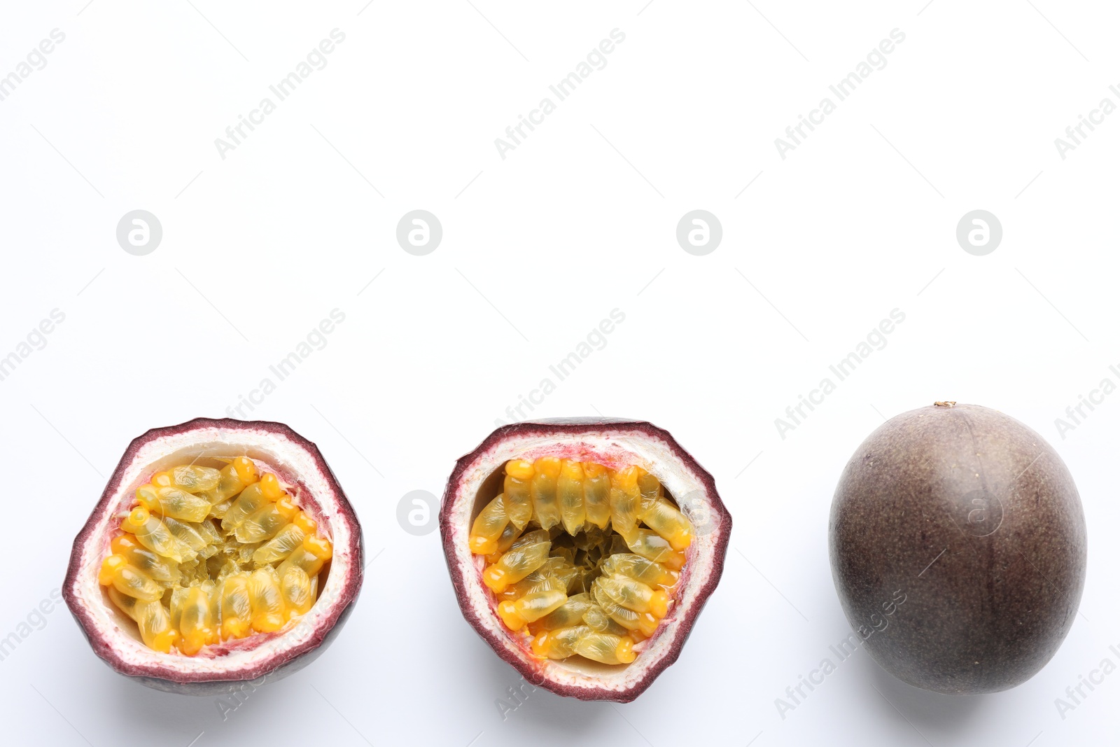 Fresh passion fruits on white background, top view. Space for text Photo of Fresh passion fruits on white background, top view. Space for text