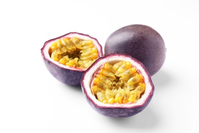 Photo of Fresh passion fruits on white background, closeup