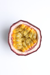 Photo of Half of fresh passion fruit on white background, top view