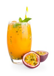 Photo of Tasty passion fruit drink with mint in glass and fresh fruit isolated on white