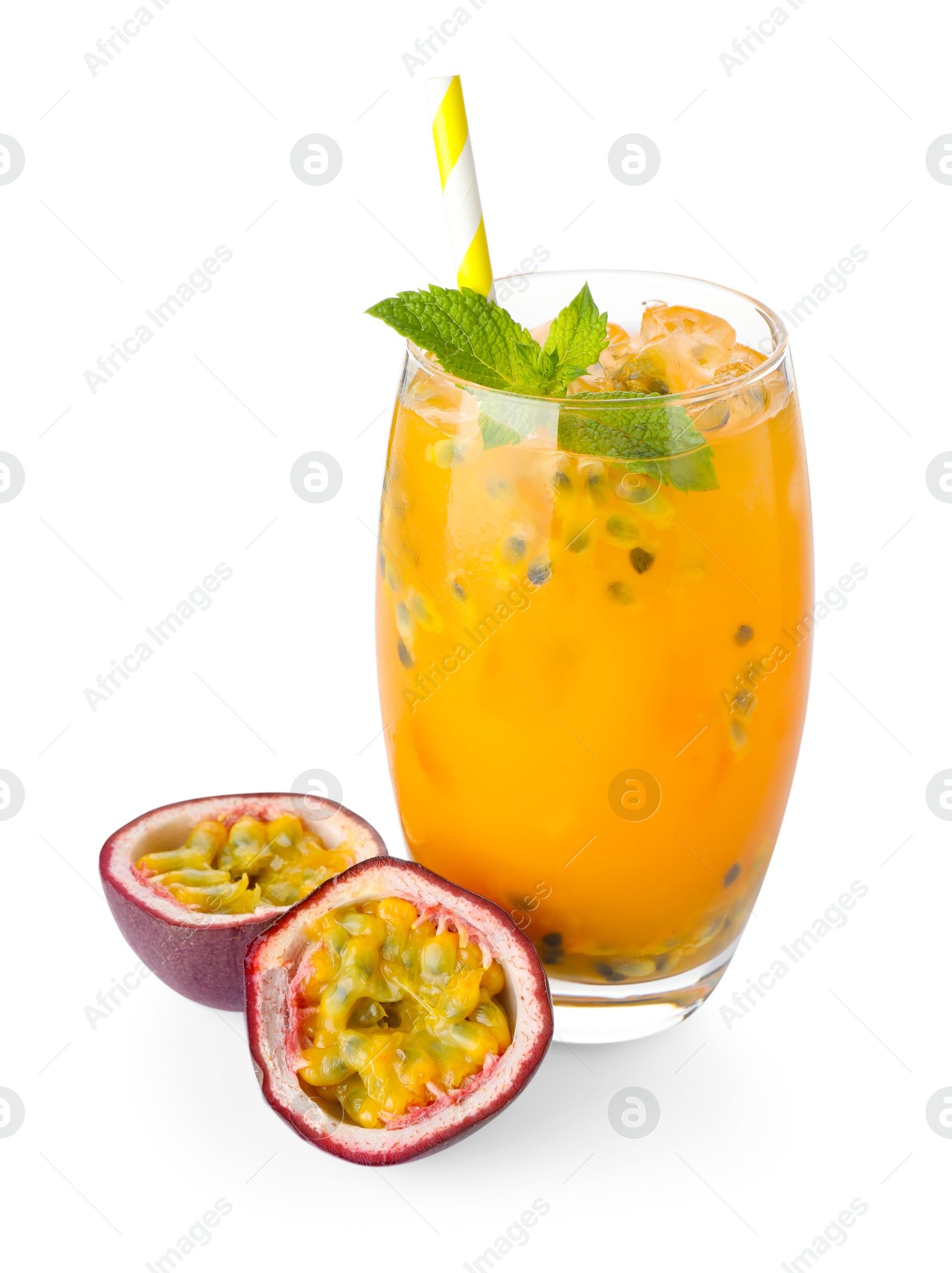 Photo of Tasty passion fruit drink with mint in glass and fresh fruit isolated on white
