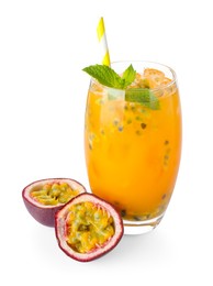 Photo of Tasty passion fruit drink with mint in glass and fresh fruit isolated on white