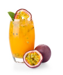 Photo of Tasty passion fruit drink with mint in glass and fresh fruits isolated on white