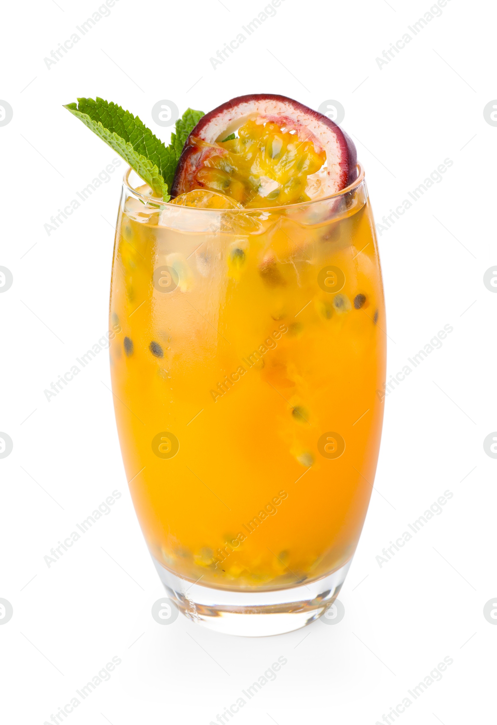 Photo of Tasty passion fruit drink with mint in glass isolated on white