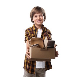 Photo of Recycling. Cute little boy with cardboard box full of different waste paper on white background