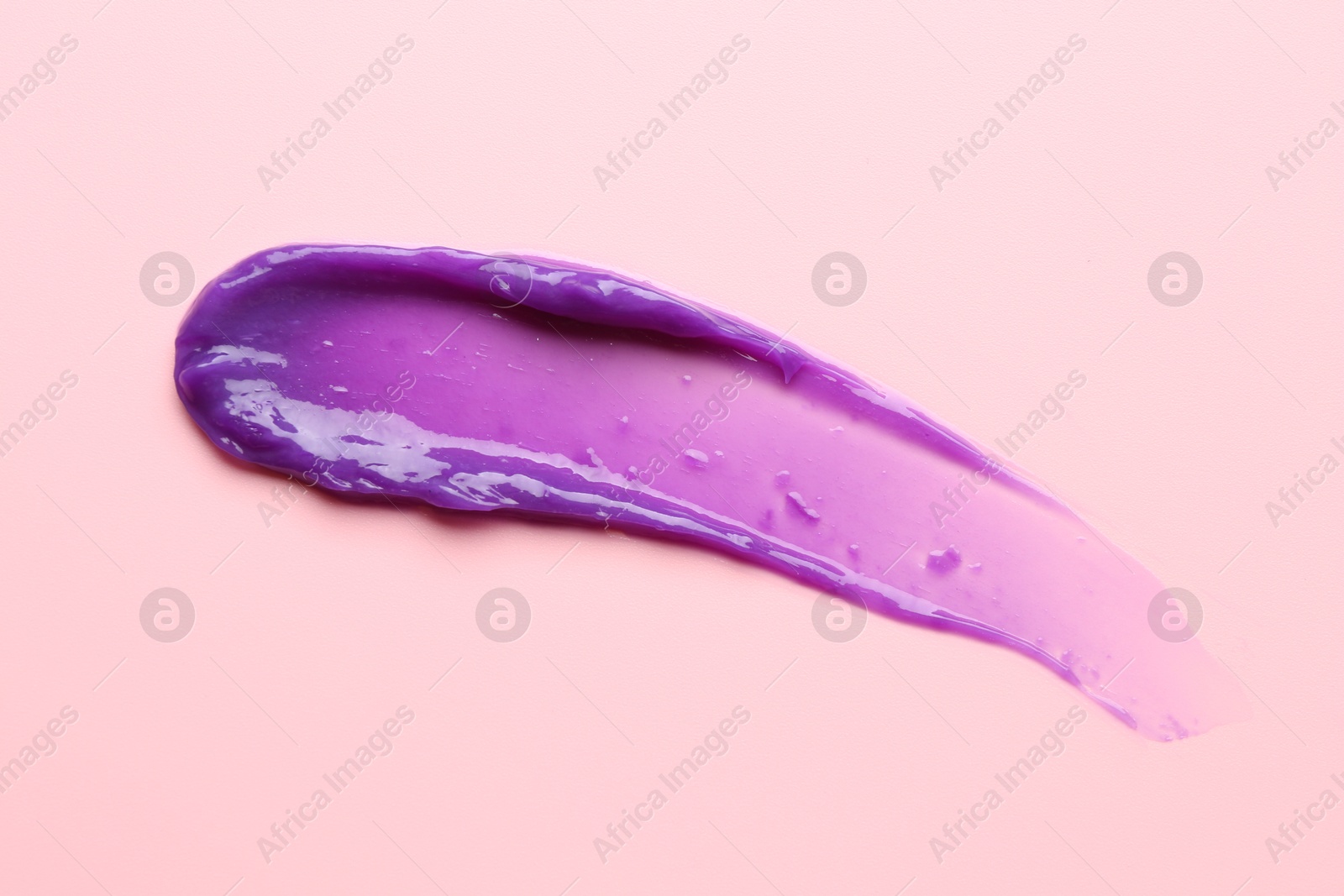Sample of blonde hair care cosmetic product on pink background, top view Photo of Sample of blonde hair care cosmetic product on pink background, top view