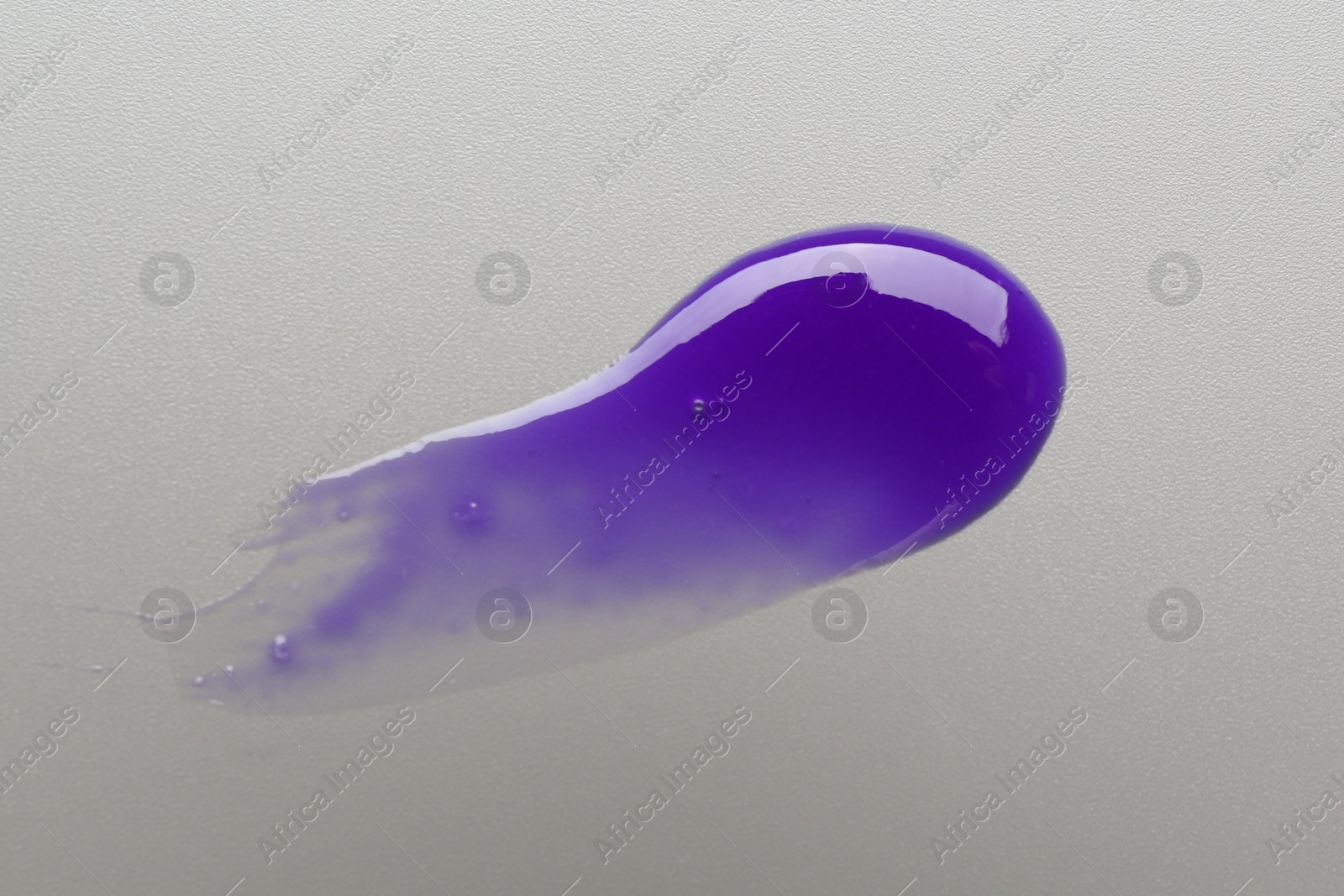 Sample of blonde hair care cosmetic product on grey background, top view Photo of Sample of blonde hair care cosmetic product on grey background, top view