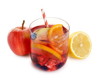 Photo of Tasty punch in glass and fresh fruits isolated on white. Refreshing drink