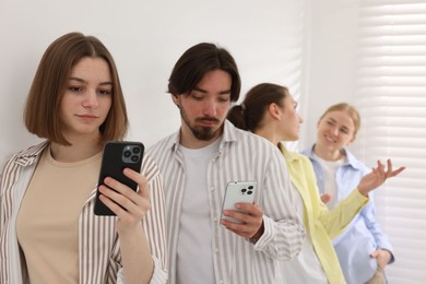 Photo of Group of people waiting in queue indoors