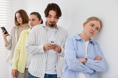 Photo of Group of people waiting in queue indoors