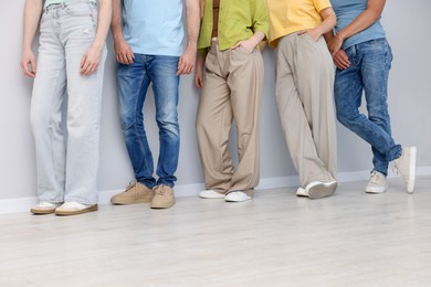 Photo of Group of people waiting in queue indoors, closeup