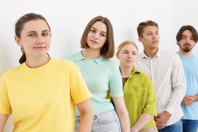 Photo of Group of people waiting in queue indoors