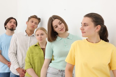 Photo of Group of people waiting in queue indoors