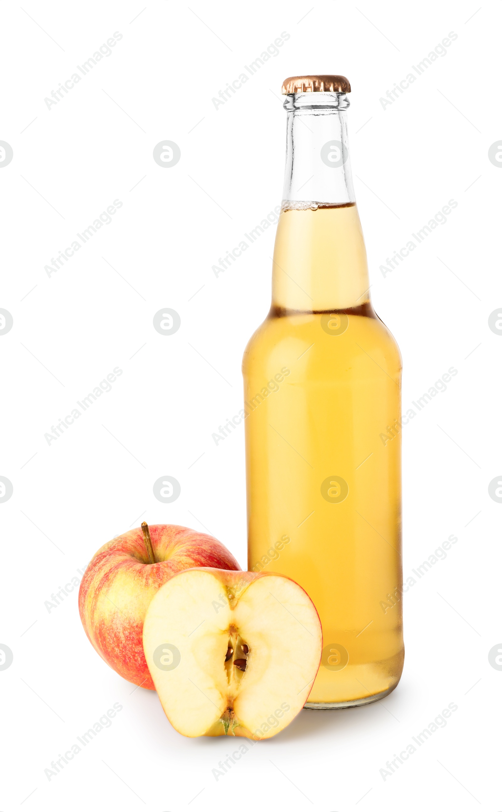 Delicious cider in glass bottle and apples isolated on white Photo of Delicious cider in glass bottle and apples isolated on white