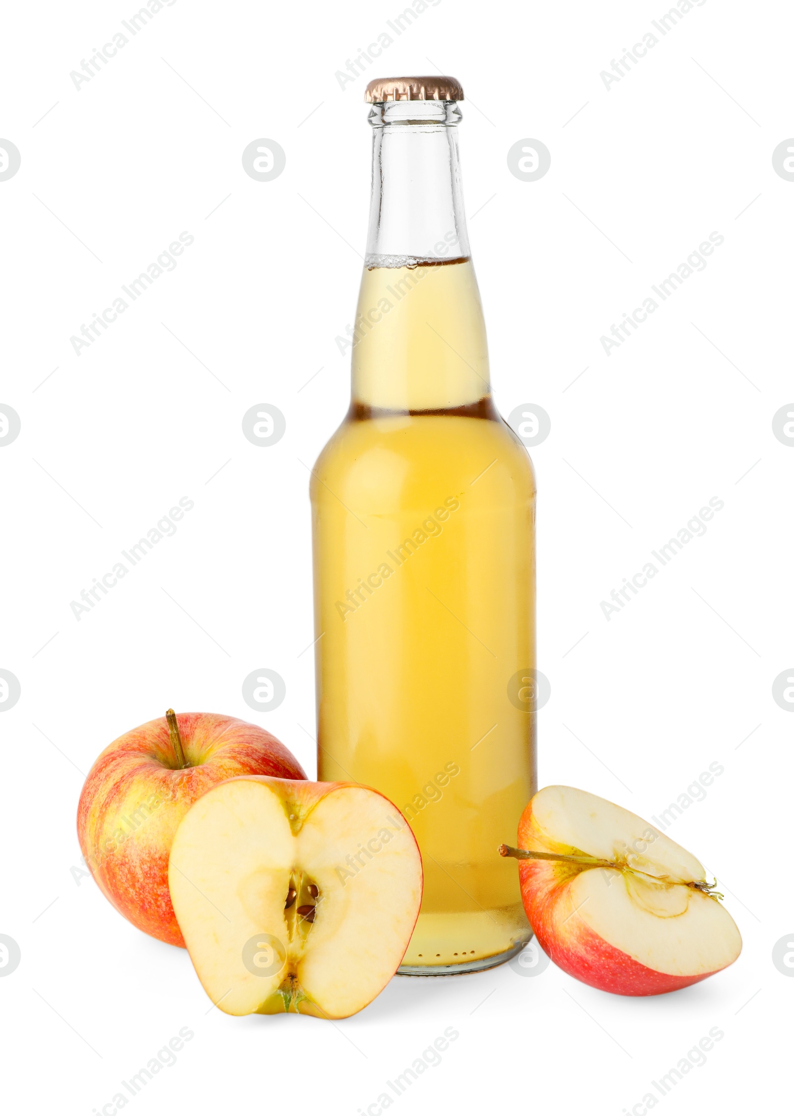 Photo of Delicious cider in glass bottle and apples isolated on white